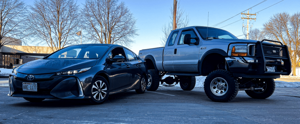 Valley City Automotive in Eau Claire, WI. A parked sedan type and pick-up type car