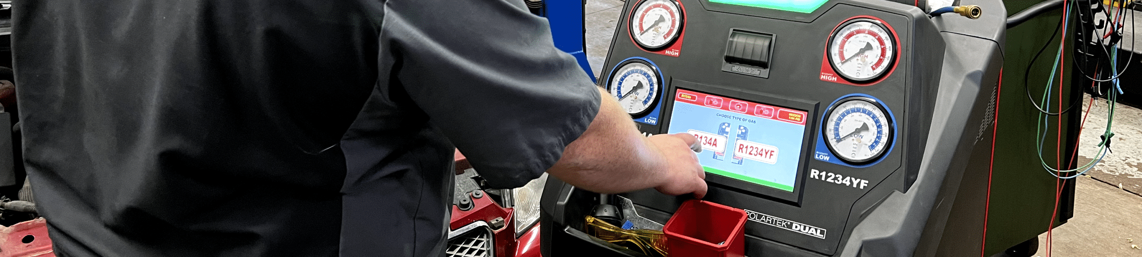 air conditioning and heating, auto repair, Eau Claire, WI, Valley City Automotive. A mechanic testing a car's air conditioning and heating system